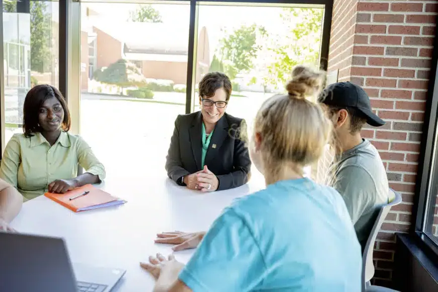 president schumacher with students